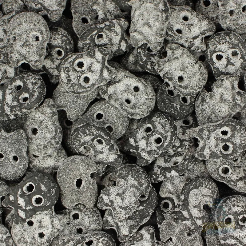 Close-up of Salty Licorice Micro Skulls, showing texture and color variations.