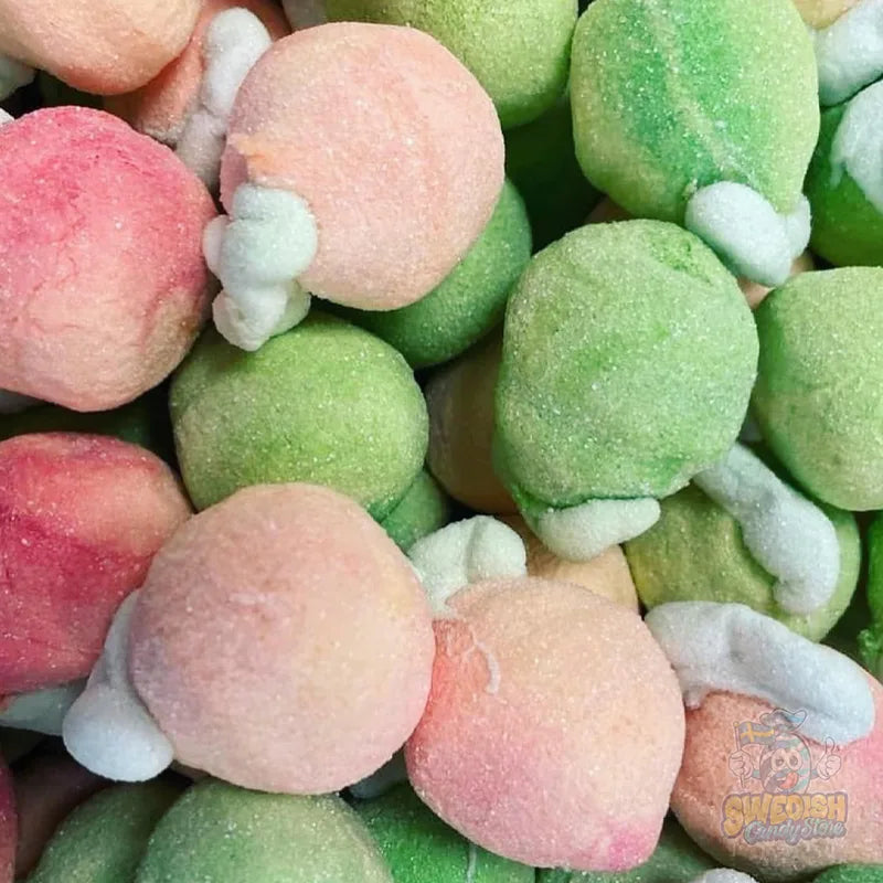 Close-up of colorful candy balls with a brand logo in the corner.
